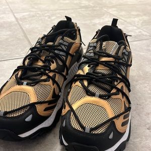 Gold fila shoes, never worn